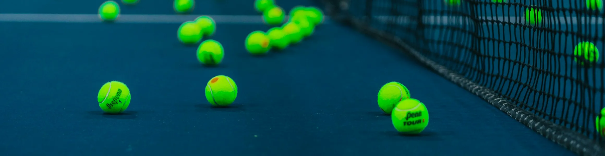 Tennis balls on padel court